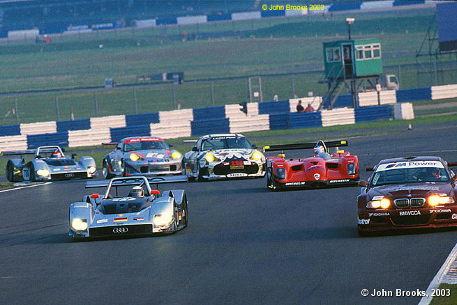 Audi/Panoz/BMW/Porsche all scrapping in the dusk at Silverstone