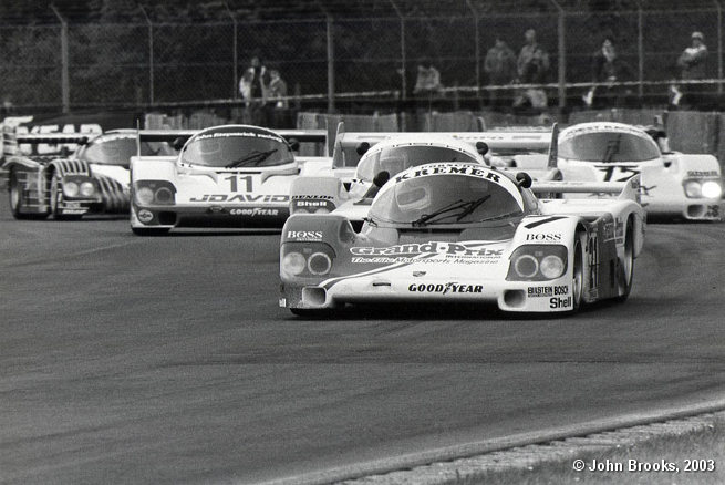 Porsche Heaven ........ 956's of Alan Jones, Bob Wollek and John Fitzpatrick sweep past Merl and Grohs ..... Silverstone 83