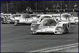 Porsche Heaven ........ 956's of Alan Jones, Bob Wollek and John Fitzpatrick sweep past Merl and Grohs ..... Silverstone 83