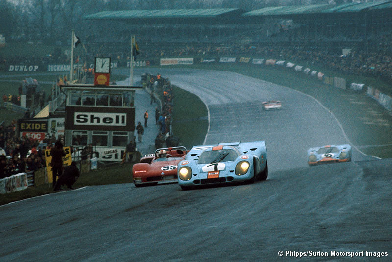 With Ickx down the road Pedro Rodriguez powers past Stommelen into Paddock Hill.